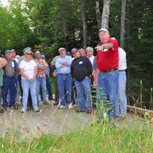 a group of people in the Errol Community Forest