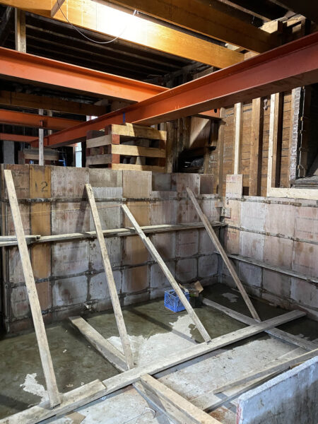 Setting new foundation for Parker J. Noyes buiding.