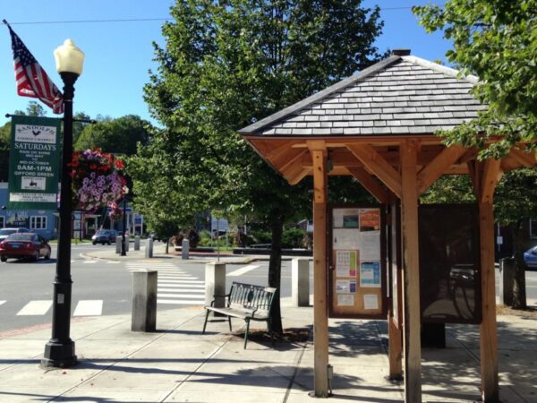 A Main Street Information kiosk built from Vermont wood.