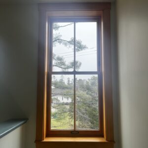 Restored window in Parker J. Noyes buidling.