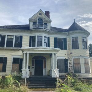 Run down historic building in Bethel, Maine.