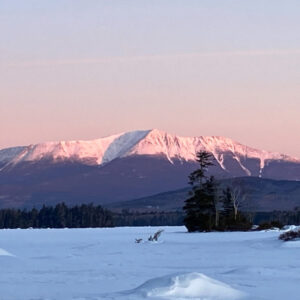 Katahdin viewed across frozen lake.