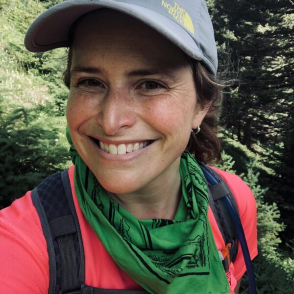 Megan Phillips outdoors hiking.