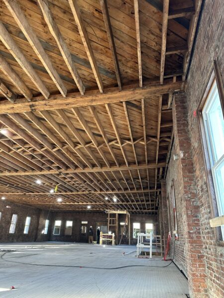 Interior of large room in building undergoing renovation