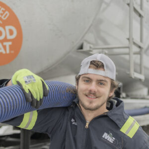 Man delivers wood pellets from a truck