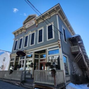 A historic 2-storey building known as the Remington Block in Chestertown NY.