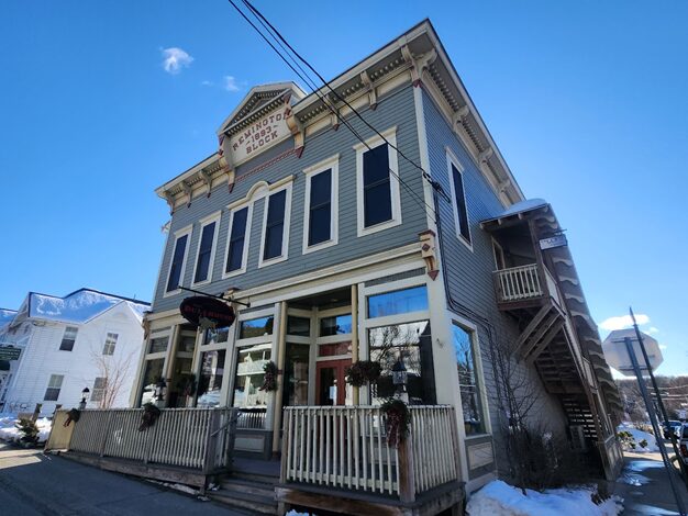 A historic 2-storey building known as the Remington Block in Chestertown NY.