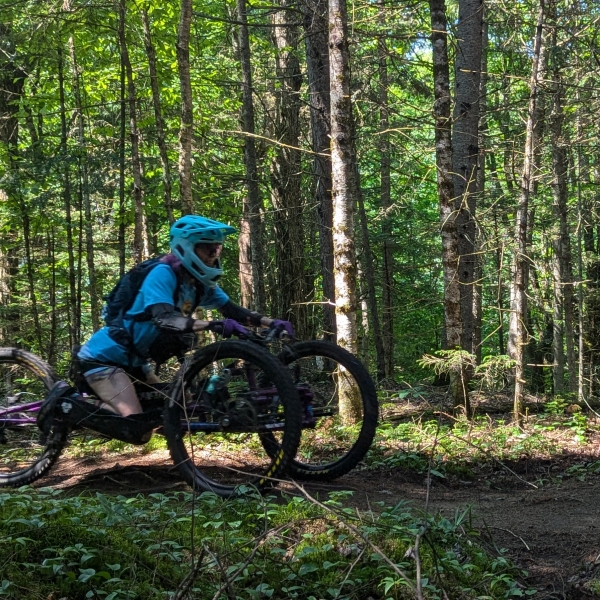 Vision impaired cyclist rides with assistance of a guide
