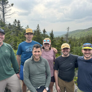 Summer interns learn outdoor leadership skills on a hike
