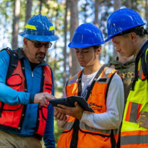 Man teaches college students how to use GPS to map forests.