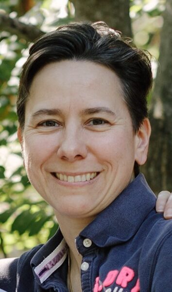 woman smiles at camera